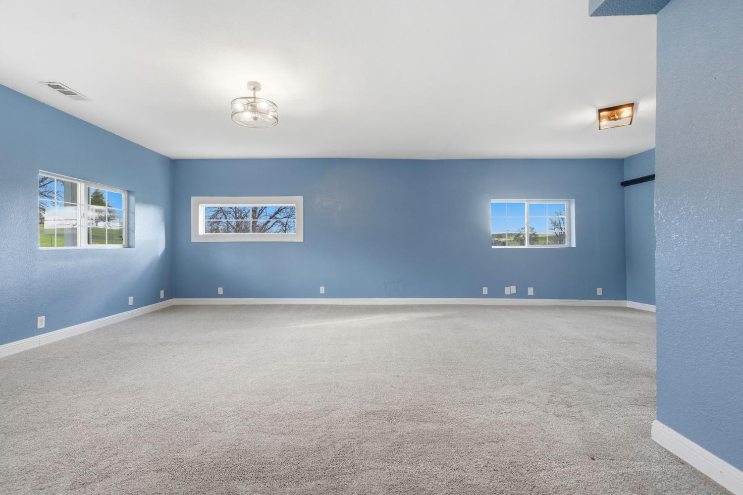 7580 Latrobe Road Shingle Springs, CA 95682 - Photo 54 of 56 a view of an empty room with a window