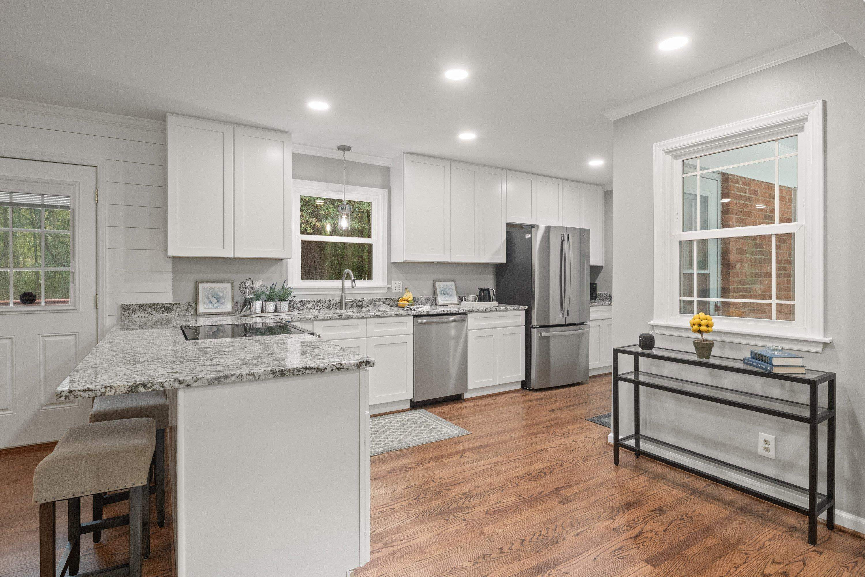 252 Hester Road Durham, NC 27703 - Photo 18 of 55 Brand new kitchen! New cabinetry with soft close doors and new stainless appliances.