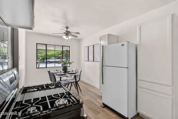 a view of a dining room with furniture window and outside view