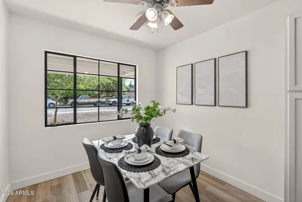 a kitchen with stainless steel appliances a refrigerator sink and stove