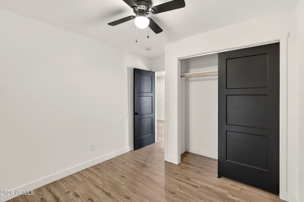 a bathroom with a sink toilet and a mirror