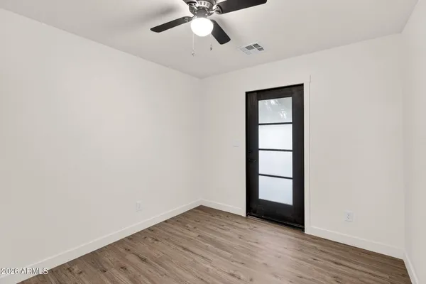 a bathroom with a shower and a toilet