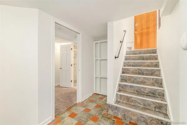 a view of an entryway with staircase