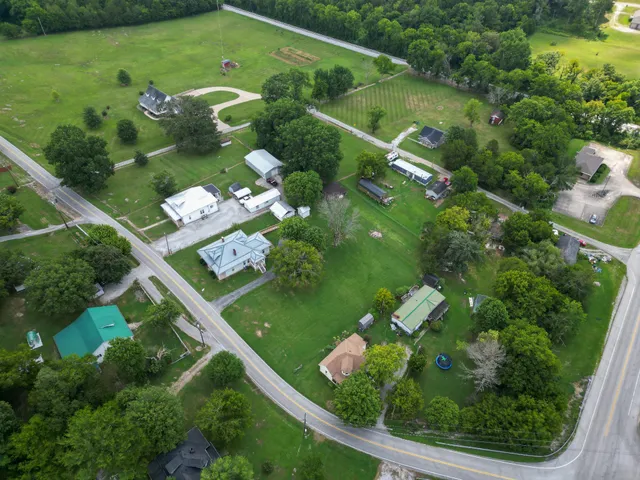 a view of a lake with a yard