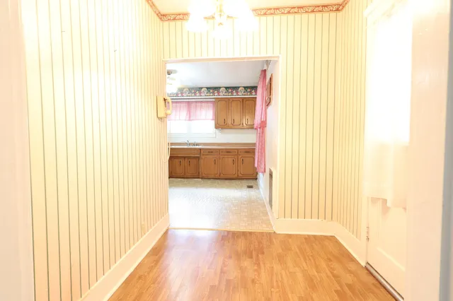 a bathroom with a tub and a window