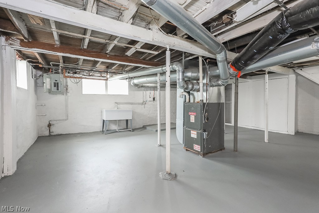 6665 State Road Cleveland, OH 44134 - Photo 29 of 30 Basement with electric panel and heating unit