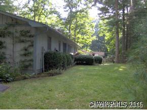 34 Westfield Road Fletcher, NC 28732 - Photo 4 of 12 a view of backyard with parked car