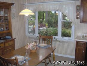 34 Westfield Road Fletcher, NC 28732 - Photo 6 of 12 a view of a dining room with furniture window and outside view