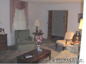 34 Westfield Road Fletcher, NC 28732 - Photo 10 of 12 a living room with furniture and a table