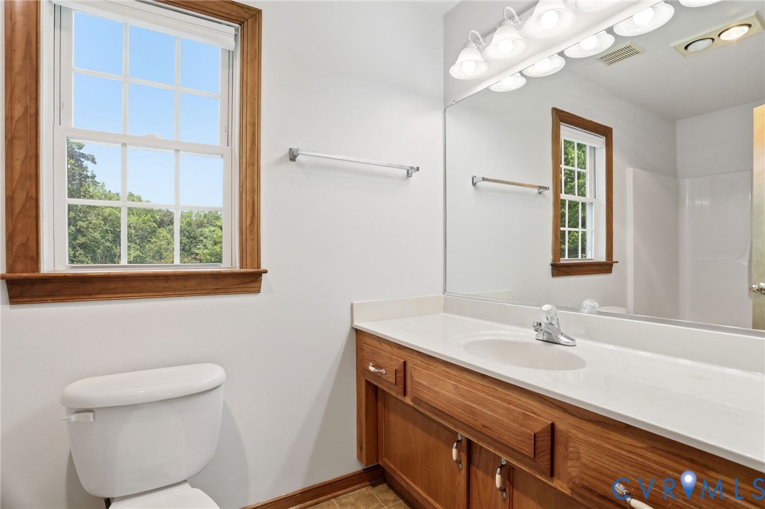 14420 Branding Iron Road Chesterfield, VA 23838 - Photo 25 of 50 Bathroom featuring a white toilet, a window with w