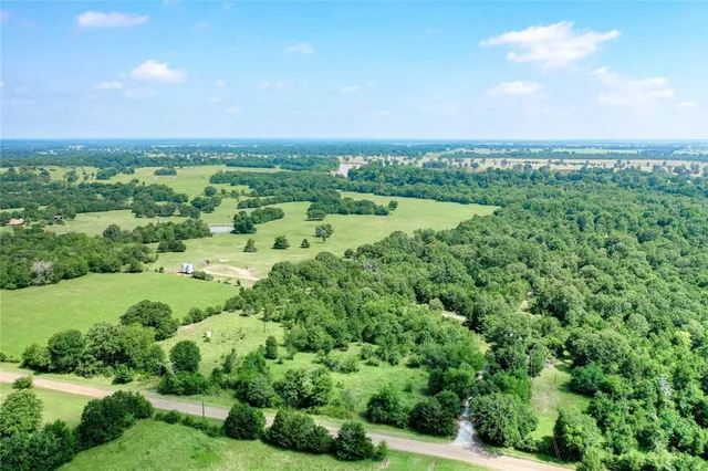 a view of a green field with lots of green space