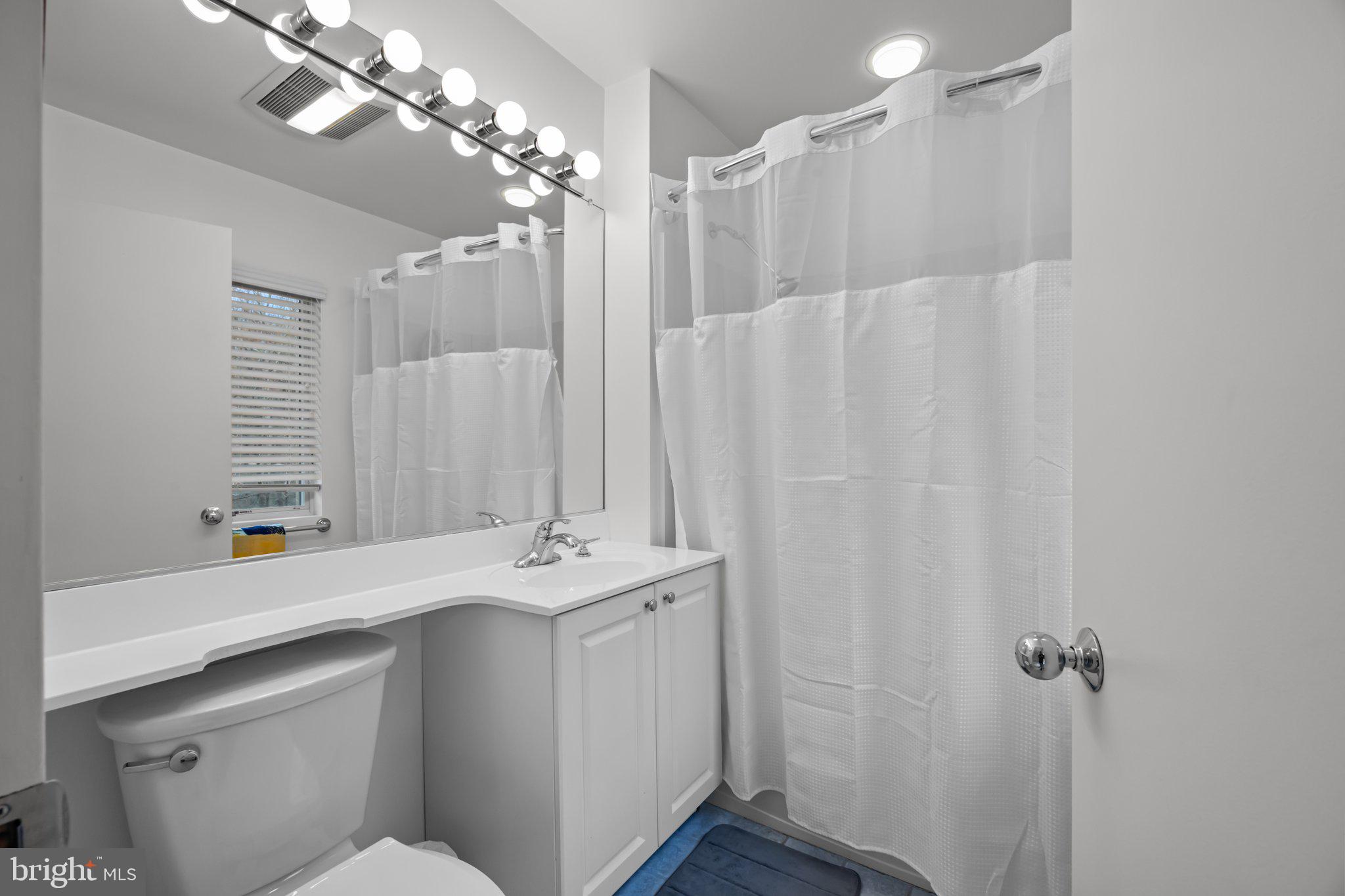 1223 Old Ford Road Huntingdon Valley, PA 19006 - Photo 16 of 36 a bathroom with a sink a mirror and a shower