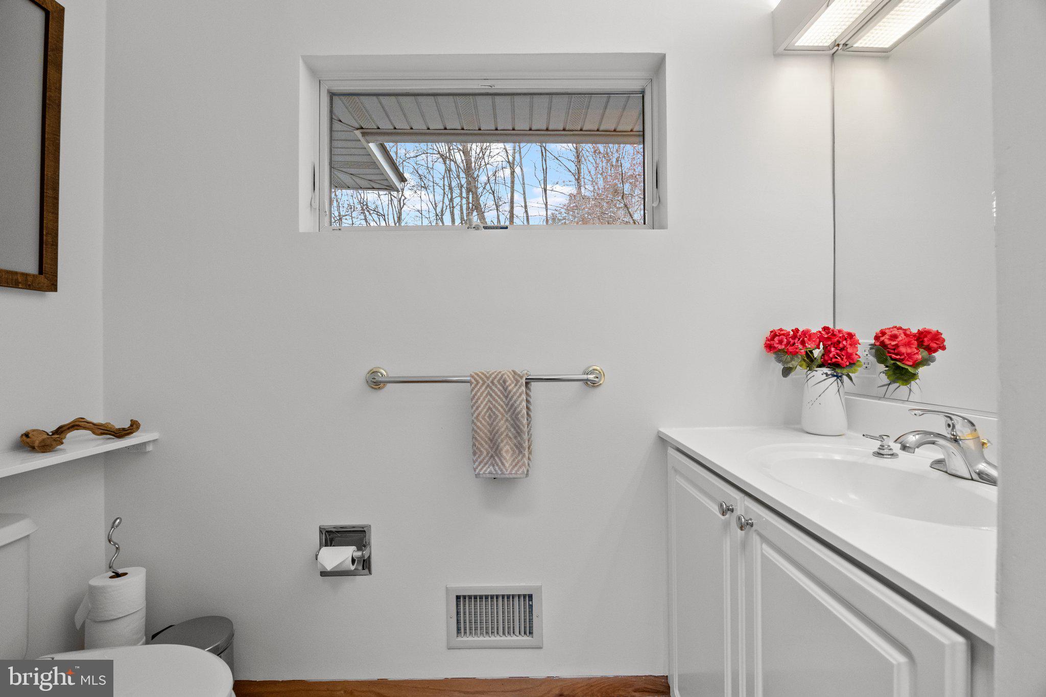 1223 Old Ford Road Huntingdon Valley, PA 19006 - Photo 6 of 36 a bathroom with a sink mirror and vanity