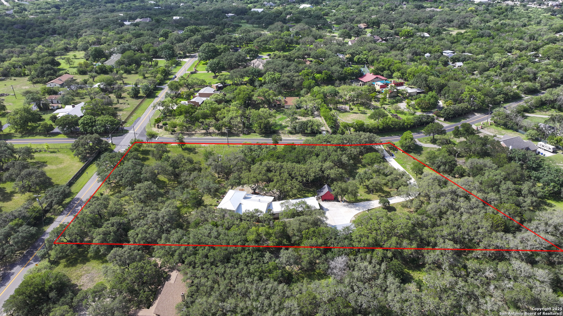5803 Hollyhock Road San Antonio, TX 78240 - Photo 1 of 51 an aerial view of a houses with yard