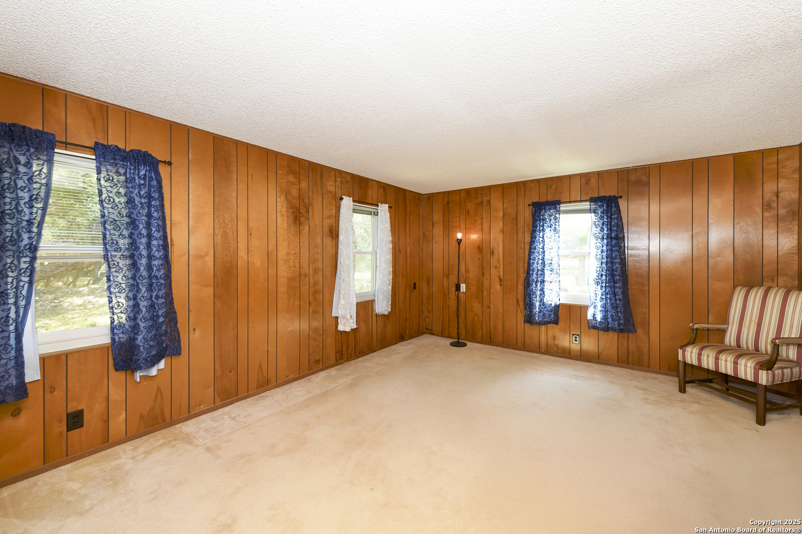 5803 Hollyhock Road San Antonio, TX 78240 - Photo 35 of 51 a view of an empty room with a window