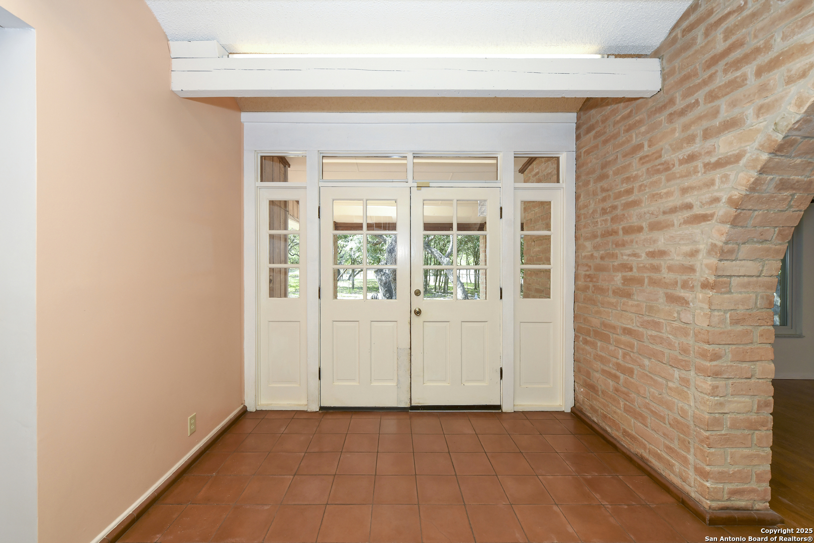 5803 Hollyhock Road San Antonio, TX 78240 - Photo 39 of 51 a view of an empty room with a window