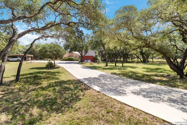 a view of a swimming pool with an outdoor space