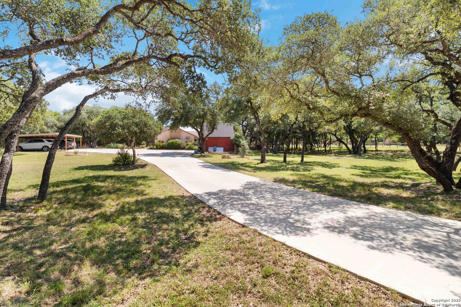 5803 Hollyhock Road San Antonio, TX 78240 - Photo 49 of 51 a view of a yard with basketball court