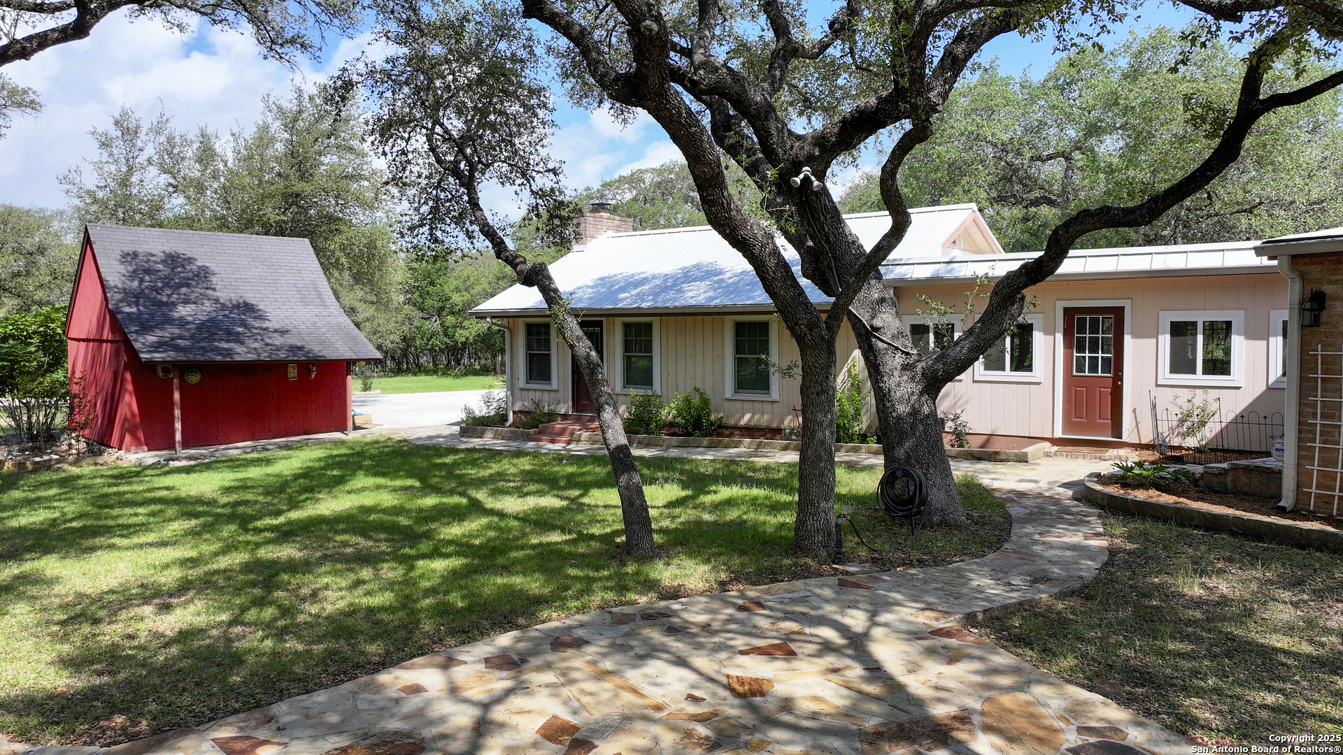 5803 Hollyhock Road San Antonio, TX 78240 - Photo 5 of 51 a view of a house with a yard
