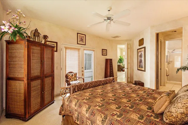 a bedroom with a bed dresser and a window