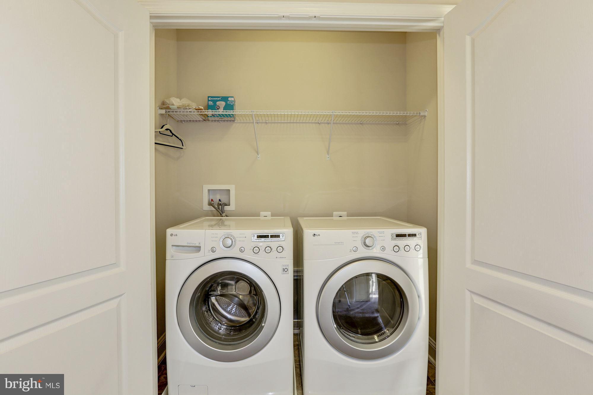 14405 Vedanta Way Silver Spring, MD 20906 - Photo 13 of 30 Large laundry closet on bedroom level, front load