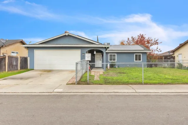 front view of house with a yard