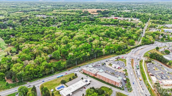 a view of a yard with an outdoor space