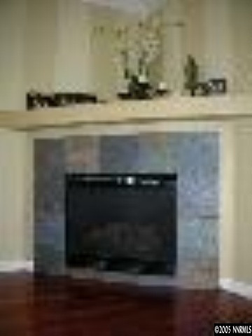 10070 Stonechase Court Reno, NV 89521 - Photo 6 of 9 a close view of a fireplace in a room