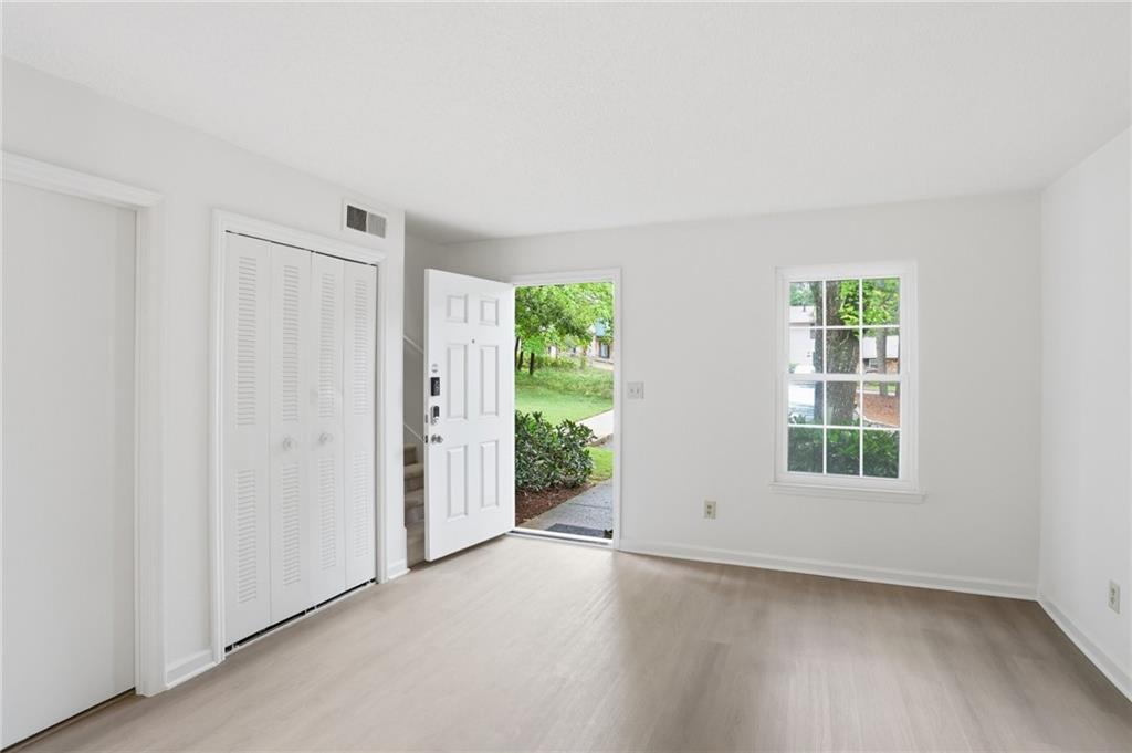 413 Promenade Court Marietta, GA 30064 - Photo 3 of 28 an empty room with windows