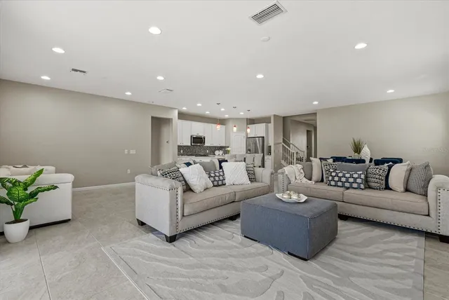 a bedroom with a bed and a tv