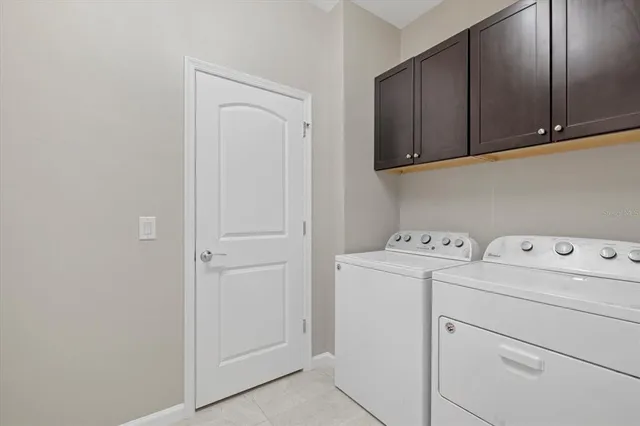 an aerial view of a house with a lake view