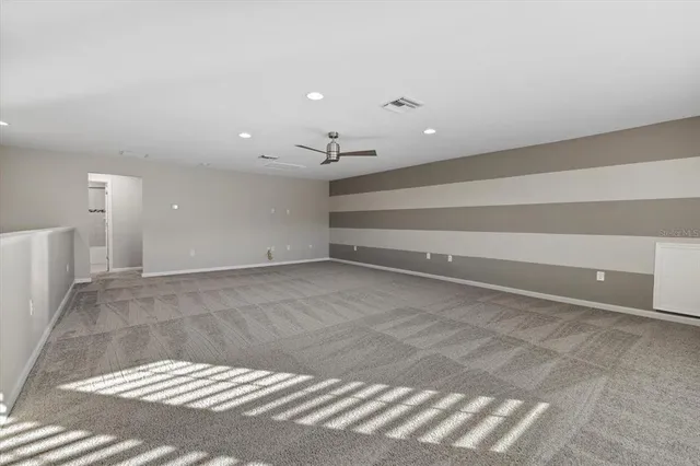 an aerial view of a residential houses with outdoor space swimming pool and lake view