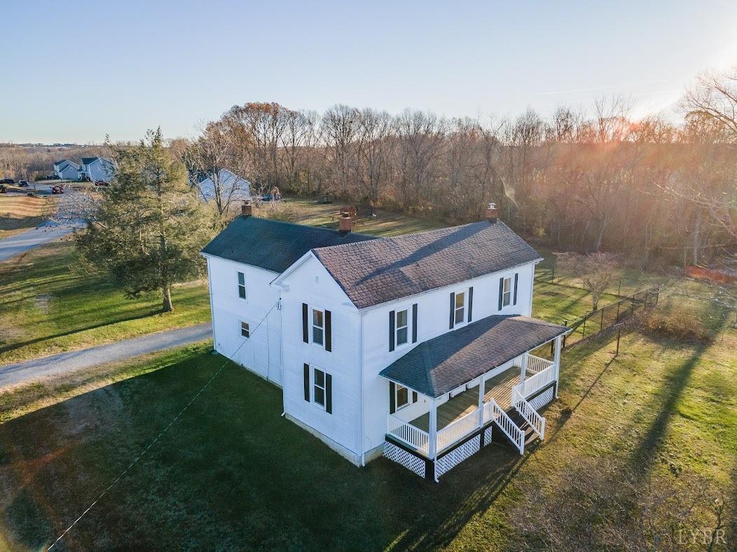 3655 Lowry Road Goode, VA 24556 - Photo 1 of 46 an aerial view of a house with a big yard