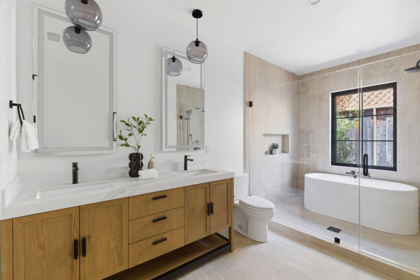 680 North San Antonio Road Los Altos, CA 94022 - Photo 10 of 19 a bathroom with a double vanity sink toilet mirror and bathtub