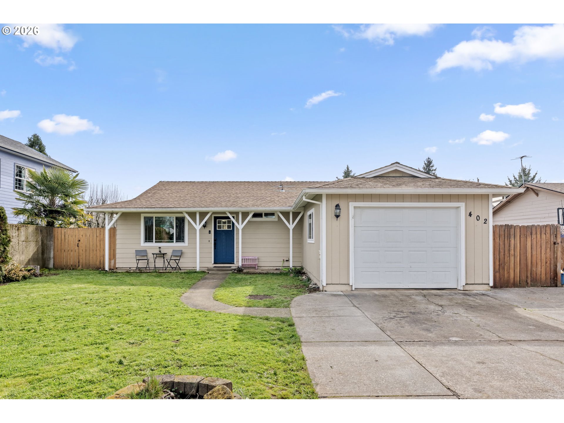 402 Clover Street Aumsville, OR 97325 - Photo 1 of 26 a view of a yard in front of a house with a yard
