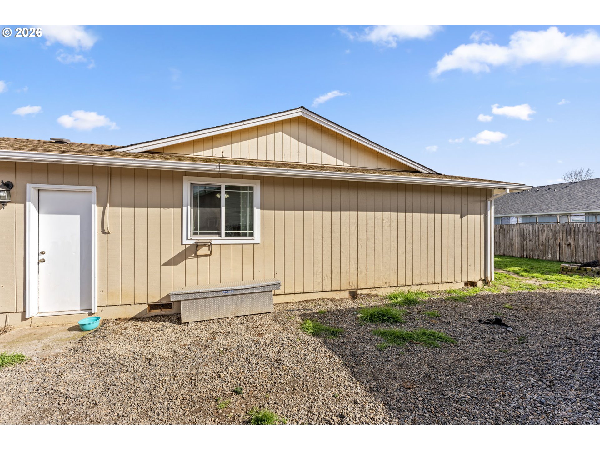 402 Clover Street Aumsville, OR 97325 - Photo 23 of 26 a view of a house with backyard and a tree