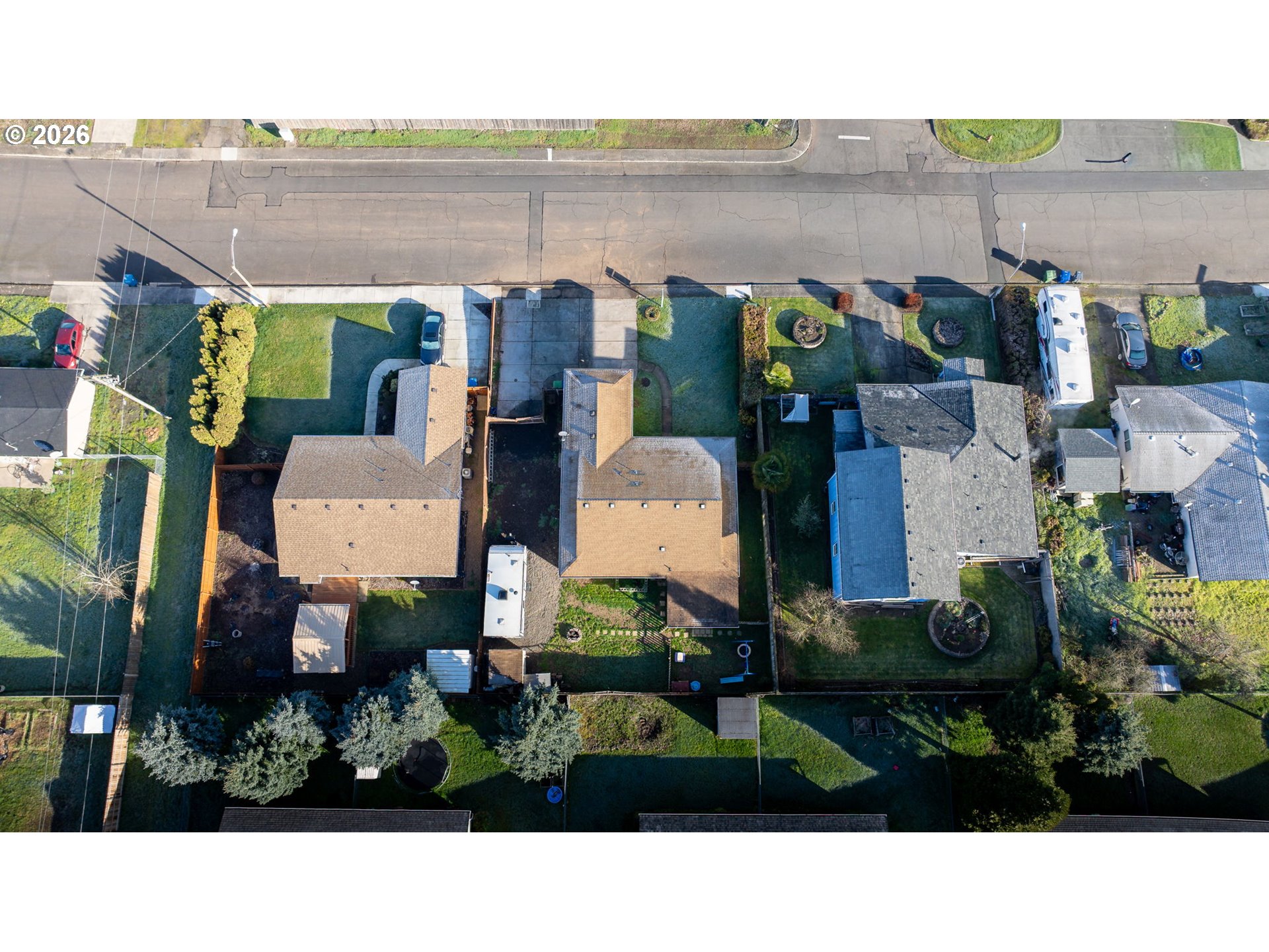 402 Clover Street Aumsville, OR 97325 - Photo 25 of 26 an aerial view of a house with lots of residential buildings ocean and mountain view in back