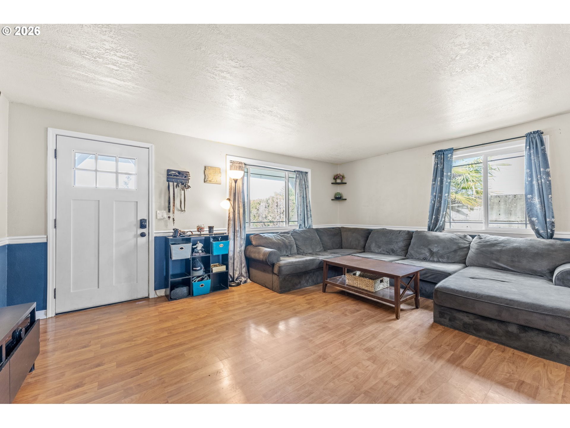 402 Clover Street Aumsville, OR 97325 - Photo 4 of 26 a living room with furniture and a wooden floor
