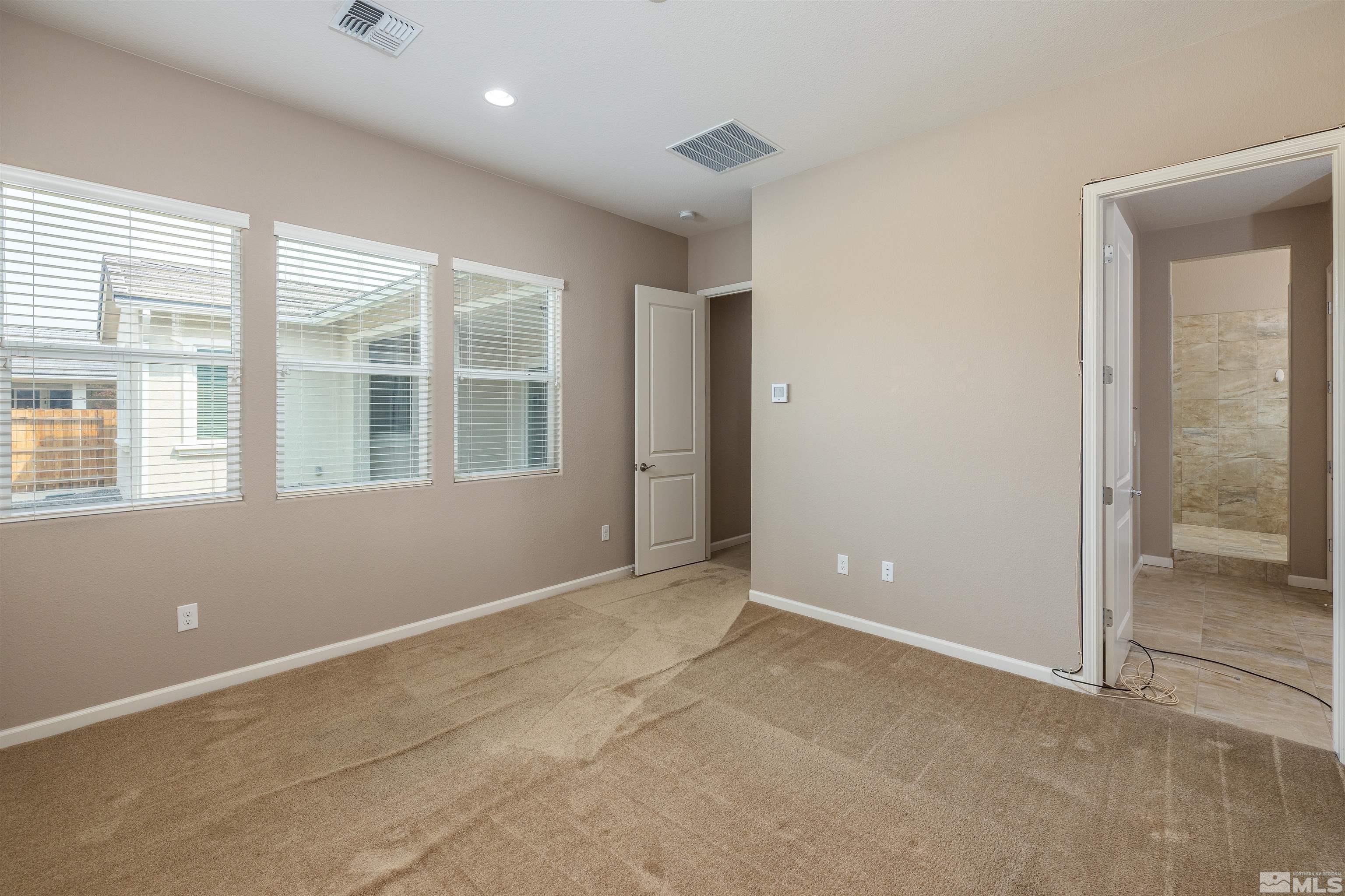 2113 Gregorgio Reno, NV 89521 - Photo 12 of 27 a view of an empty room with a window