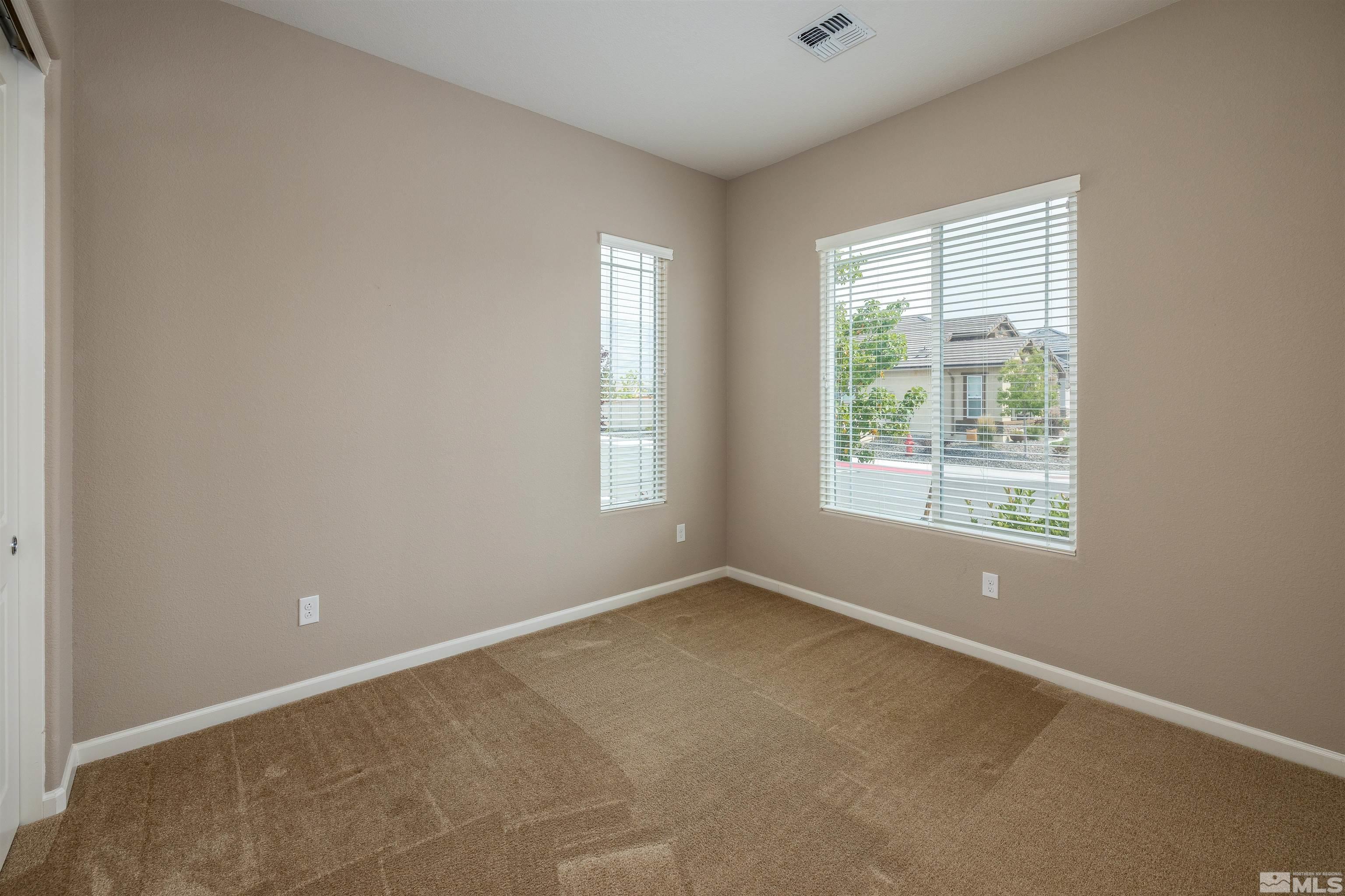 2113 Gregorgio Reno, NV 89521 - Photo 19 of 27 a view of an empty room with a window