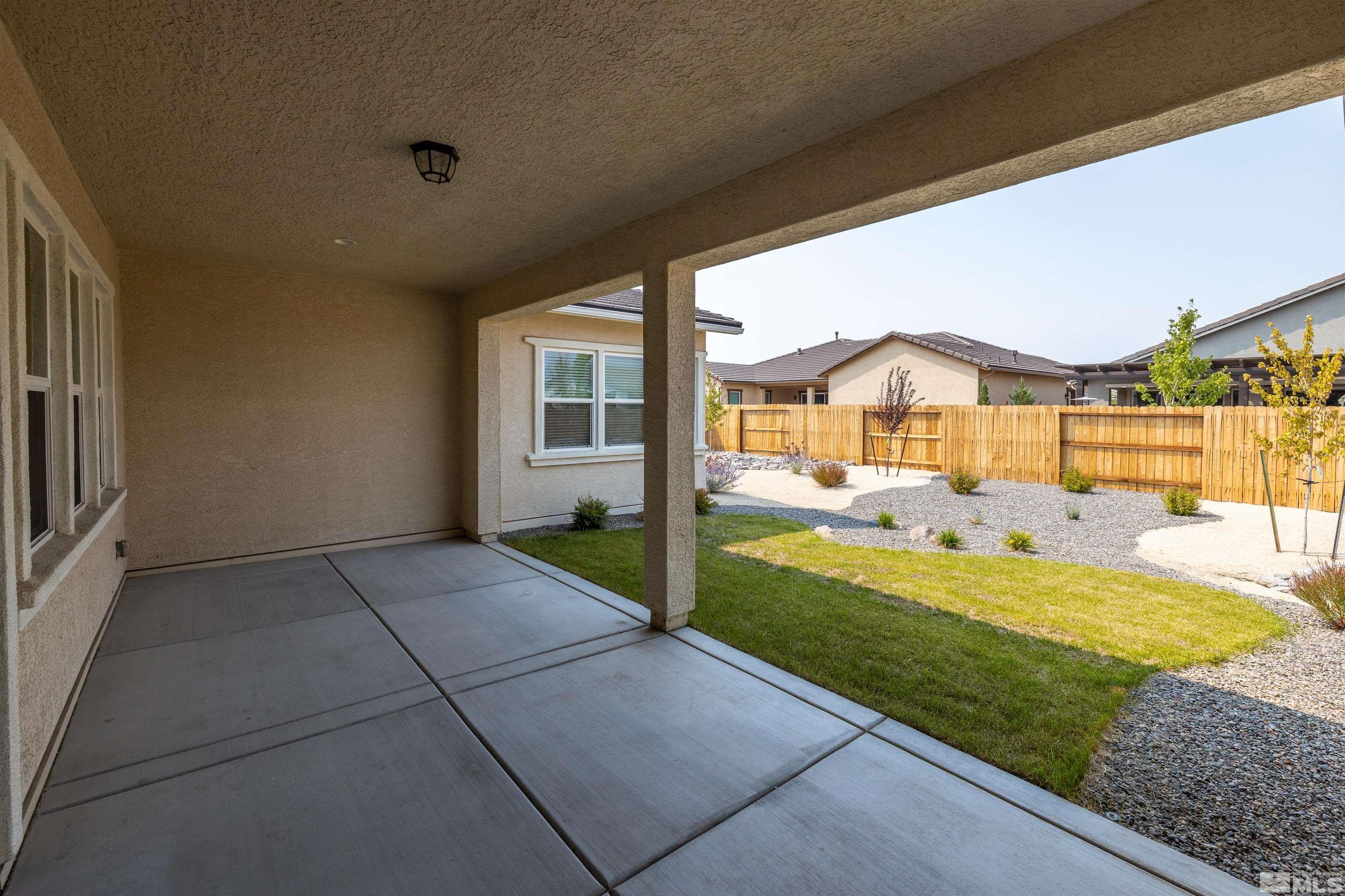 2113 Gregorgio Reno, NV 89521 - Photo 23 of 27 a view of a house with a yard