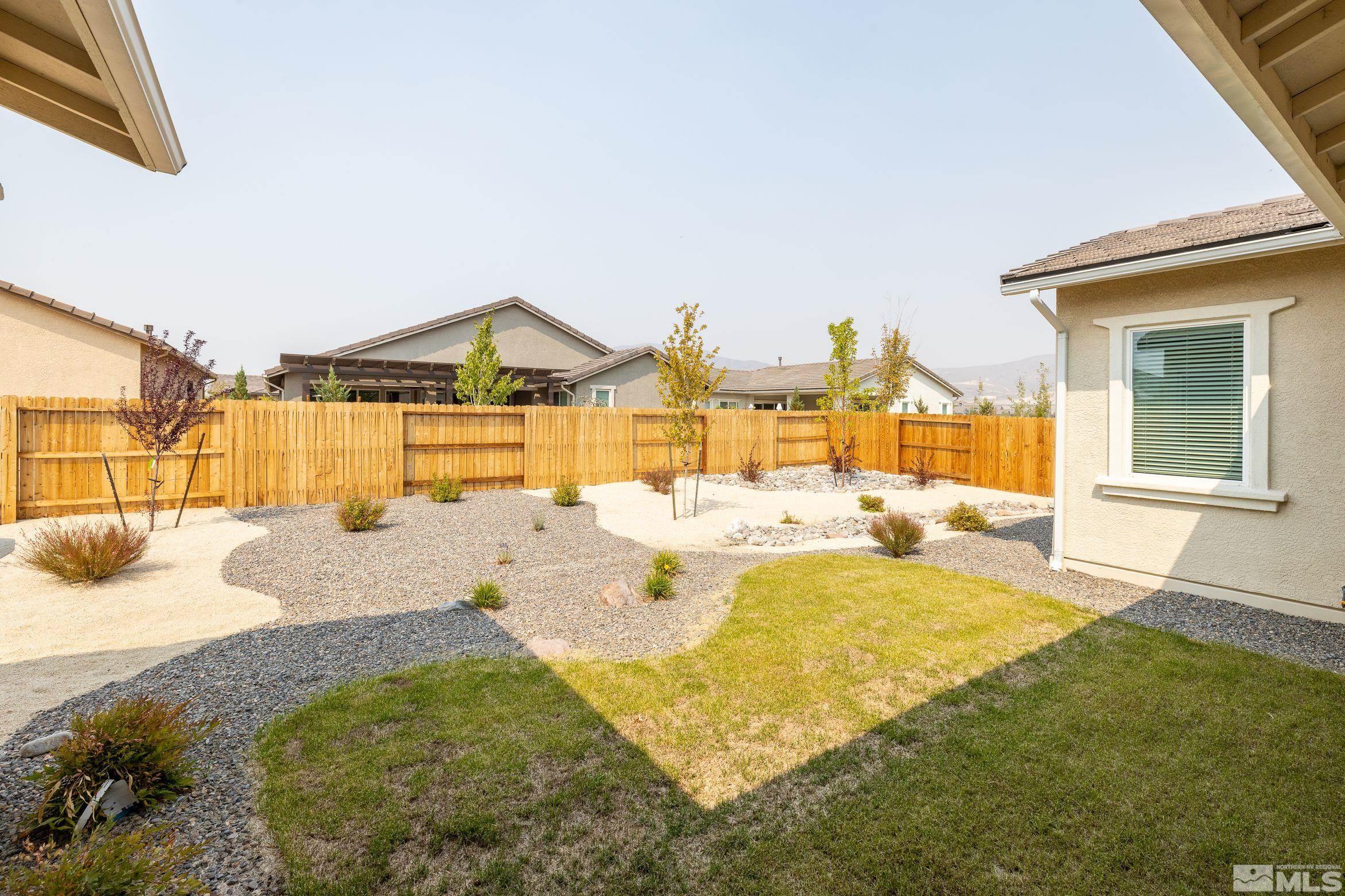 2113 Gregorgio Reno, NV 89521 - Photo 27 of 27 a view of a house with a swimming pool