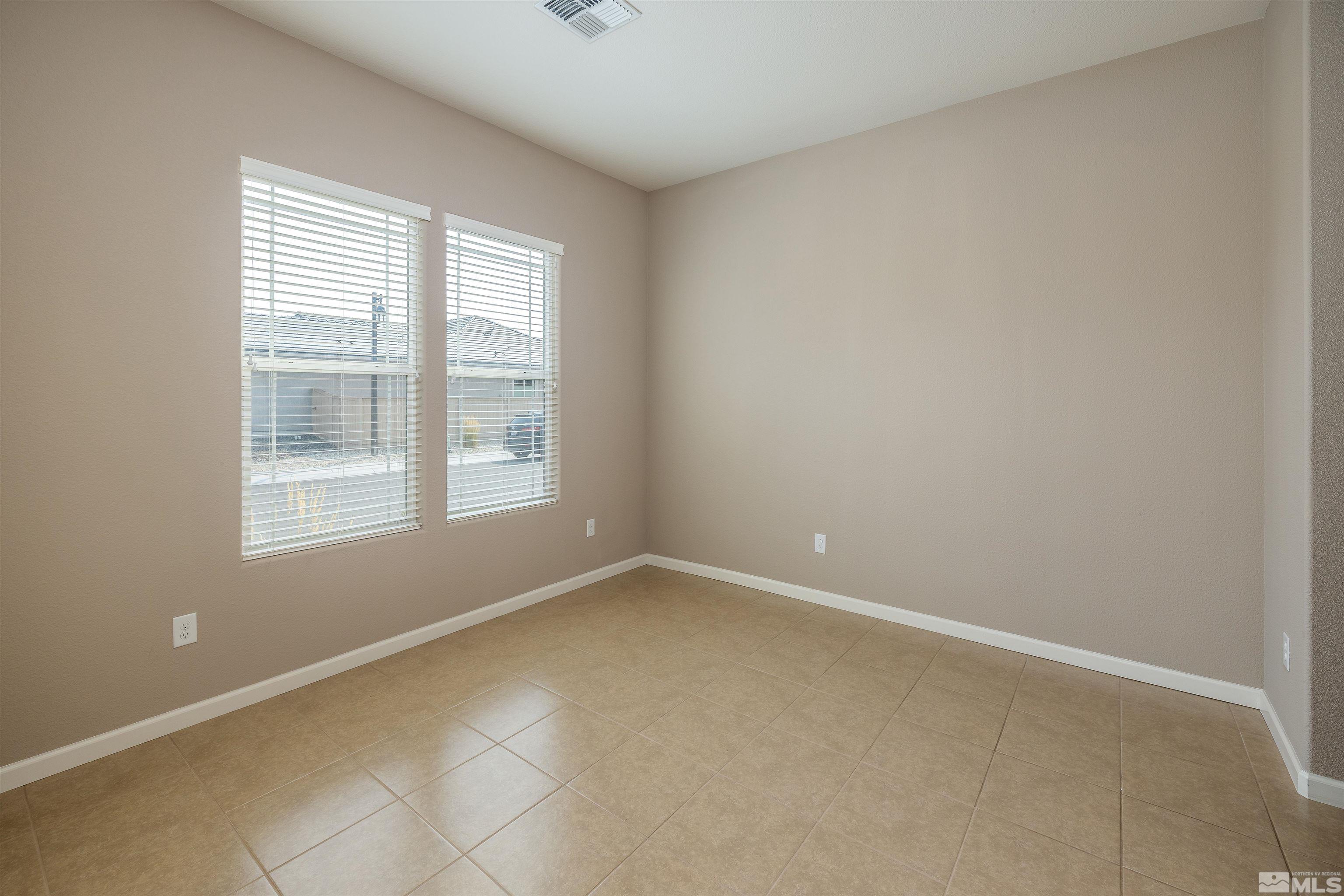 2113 Gregorgio Reno, NV 89521 - Photo 9 of 27 an empty room with a window