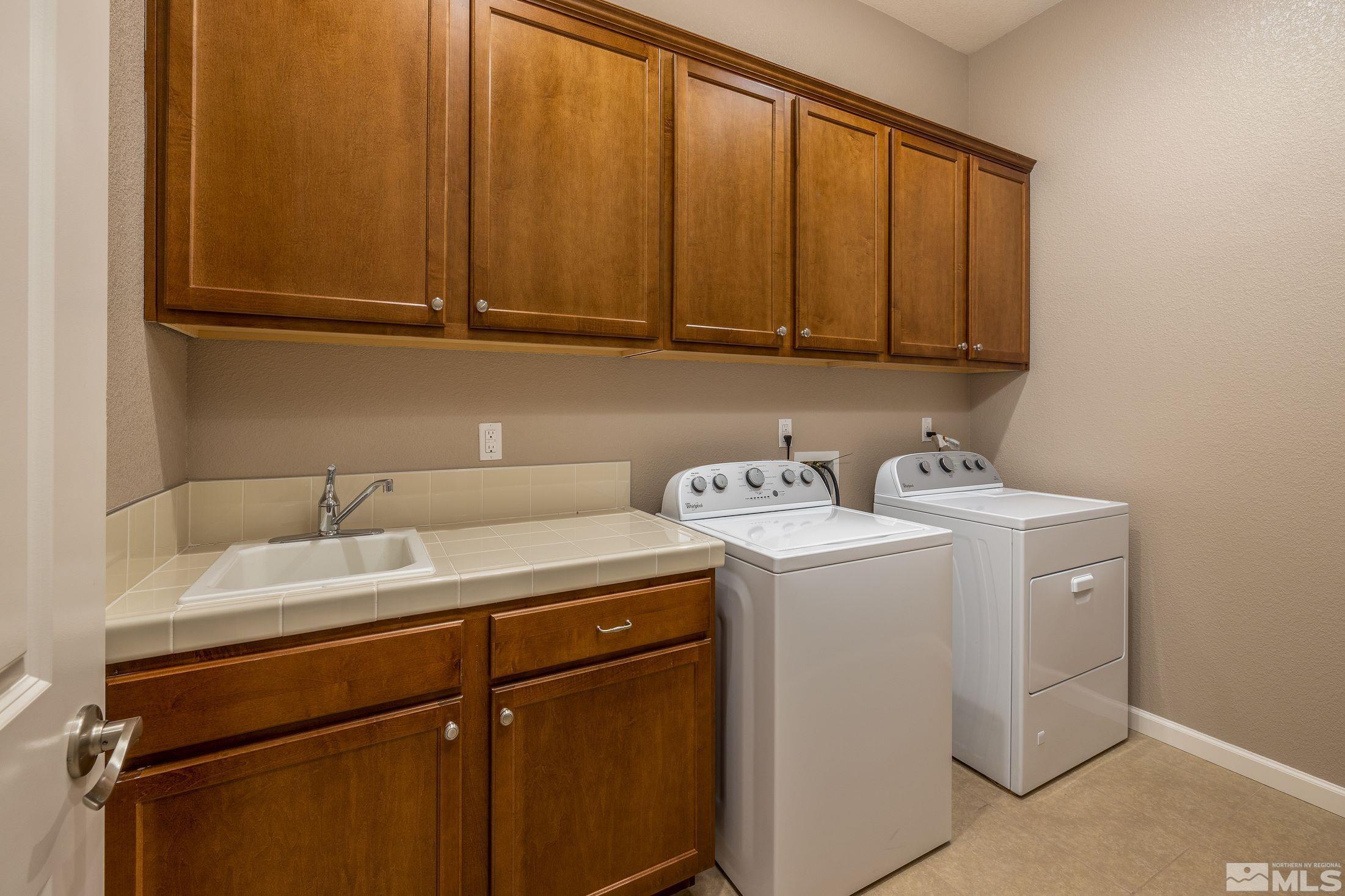 2113 Gregorgio Reno, NV 89521 - Photo 10 of 27 a utility room with dryer and washer