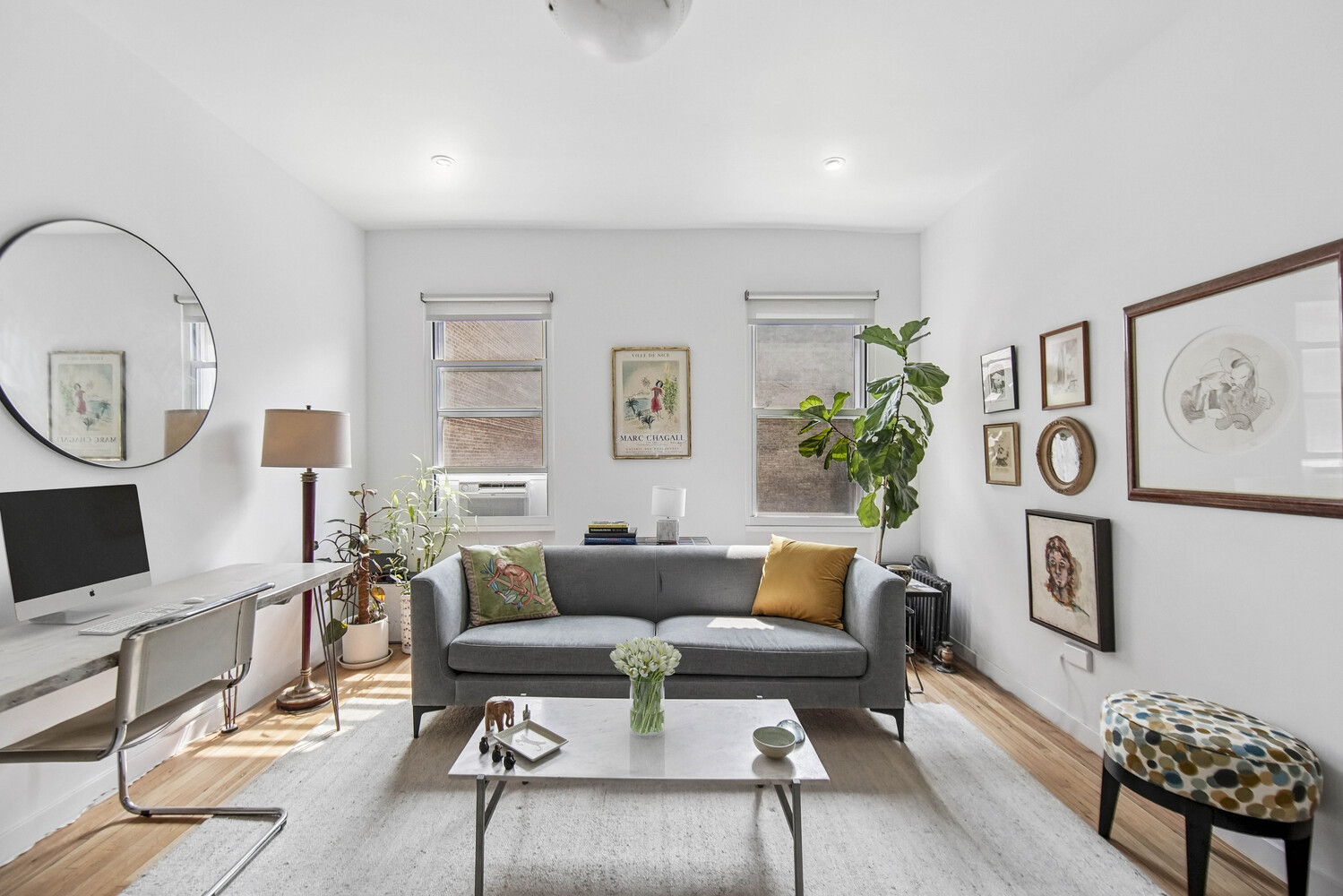 565 West 169th Street, Unit 3A Manhattan, NY 10032 - Photo 2 of 11 a living room with furniture and wooden floor