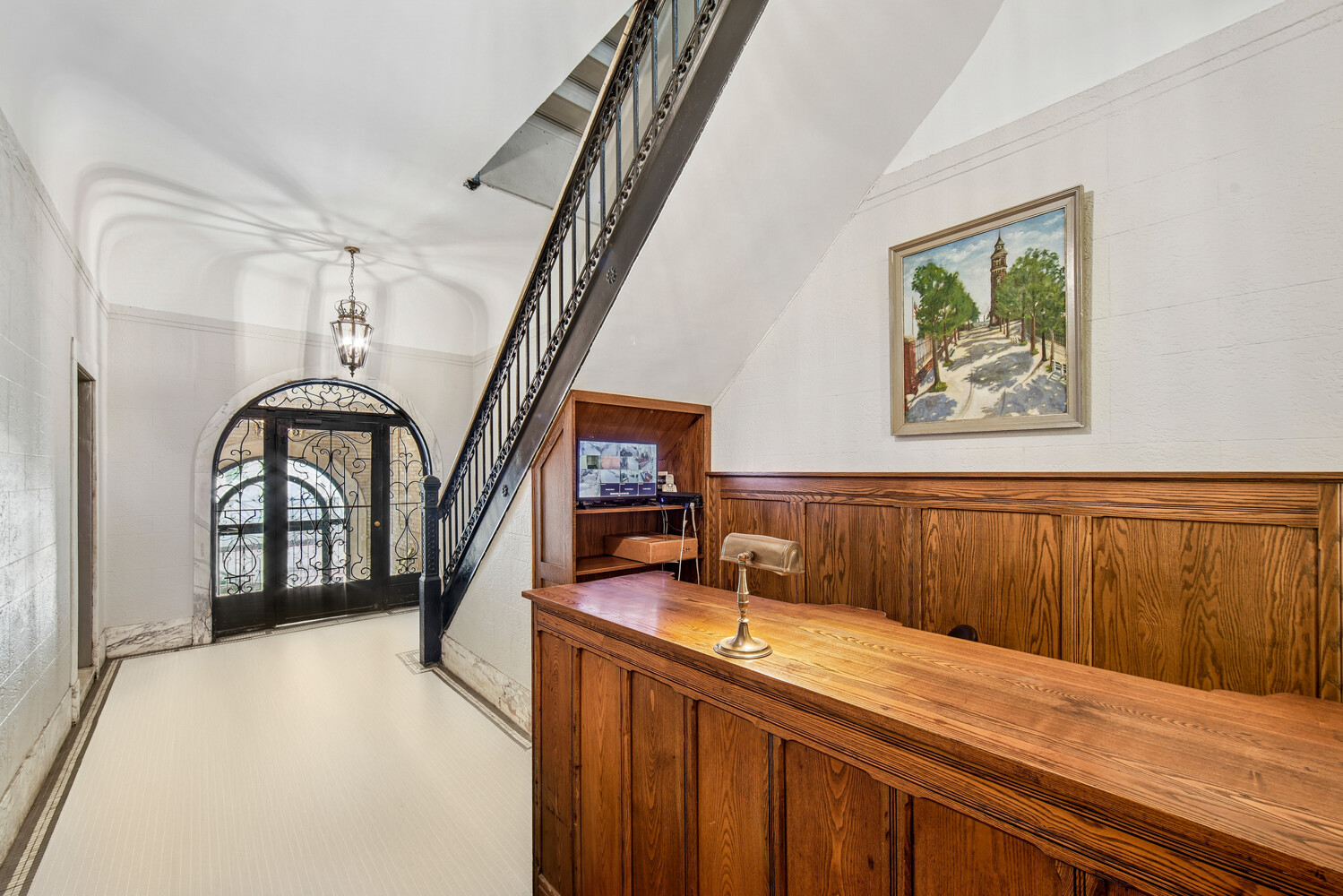 565 West 169th Street, Unit 3A Manhattan, NY 10032 - Photo 9 of 11 a bathroom with a granite countertop sink a mirror and a bathtub