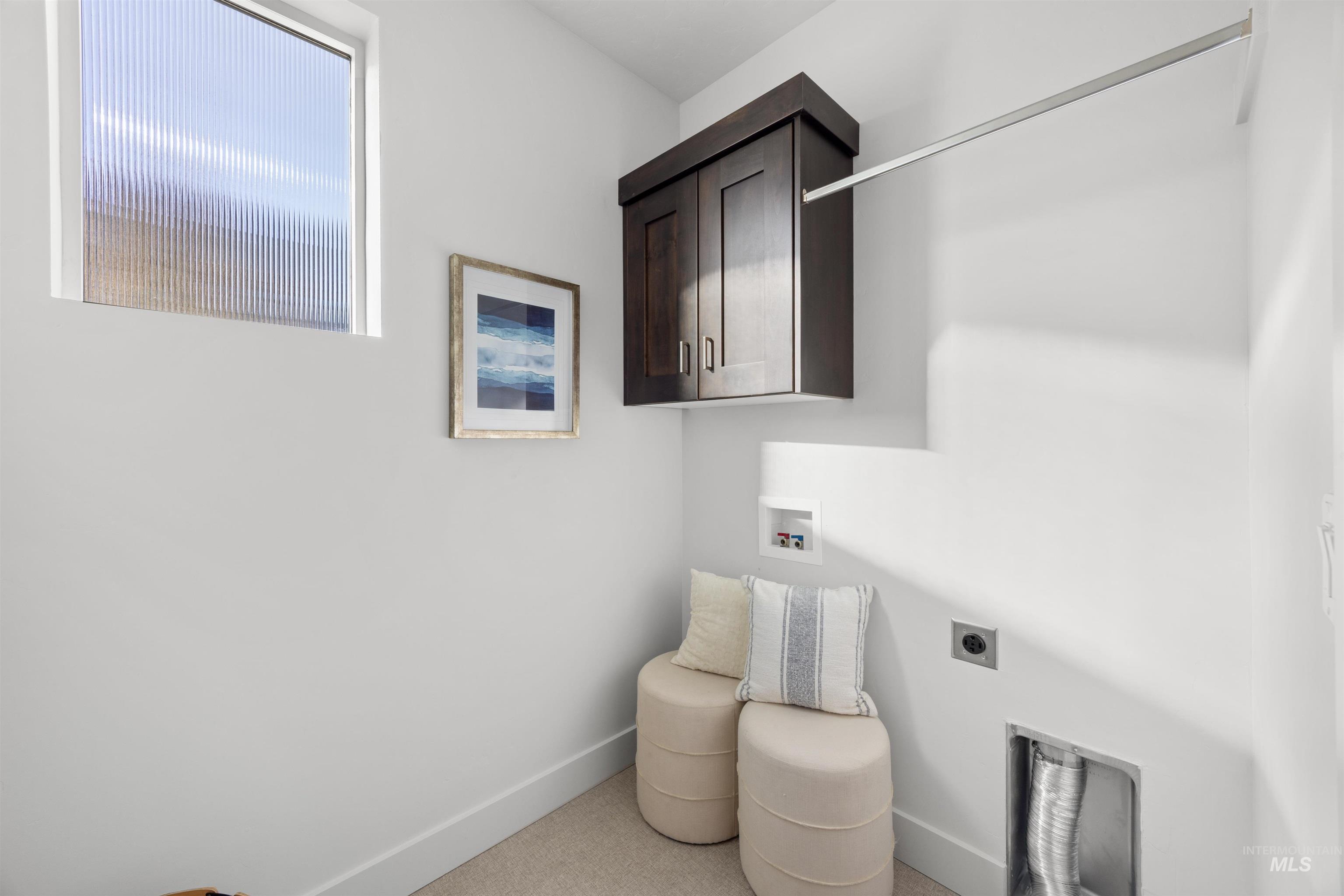 3282 South Millbrook Way Boise, ID 83716 - Photo 13 of 45 Laundry area featuring hookup for a washing machine, electric dryer hookup, and cabinet space