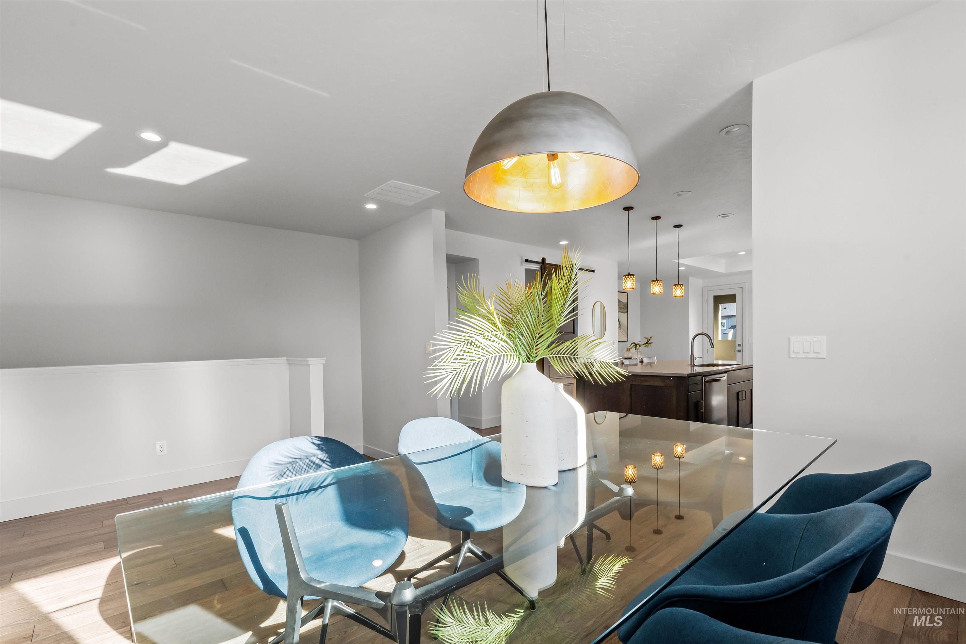 3282 South Millbrook Way Boise, ID 83716 - Photo 26 of 45 Dining space with wood finished floors and baseboards
