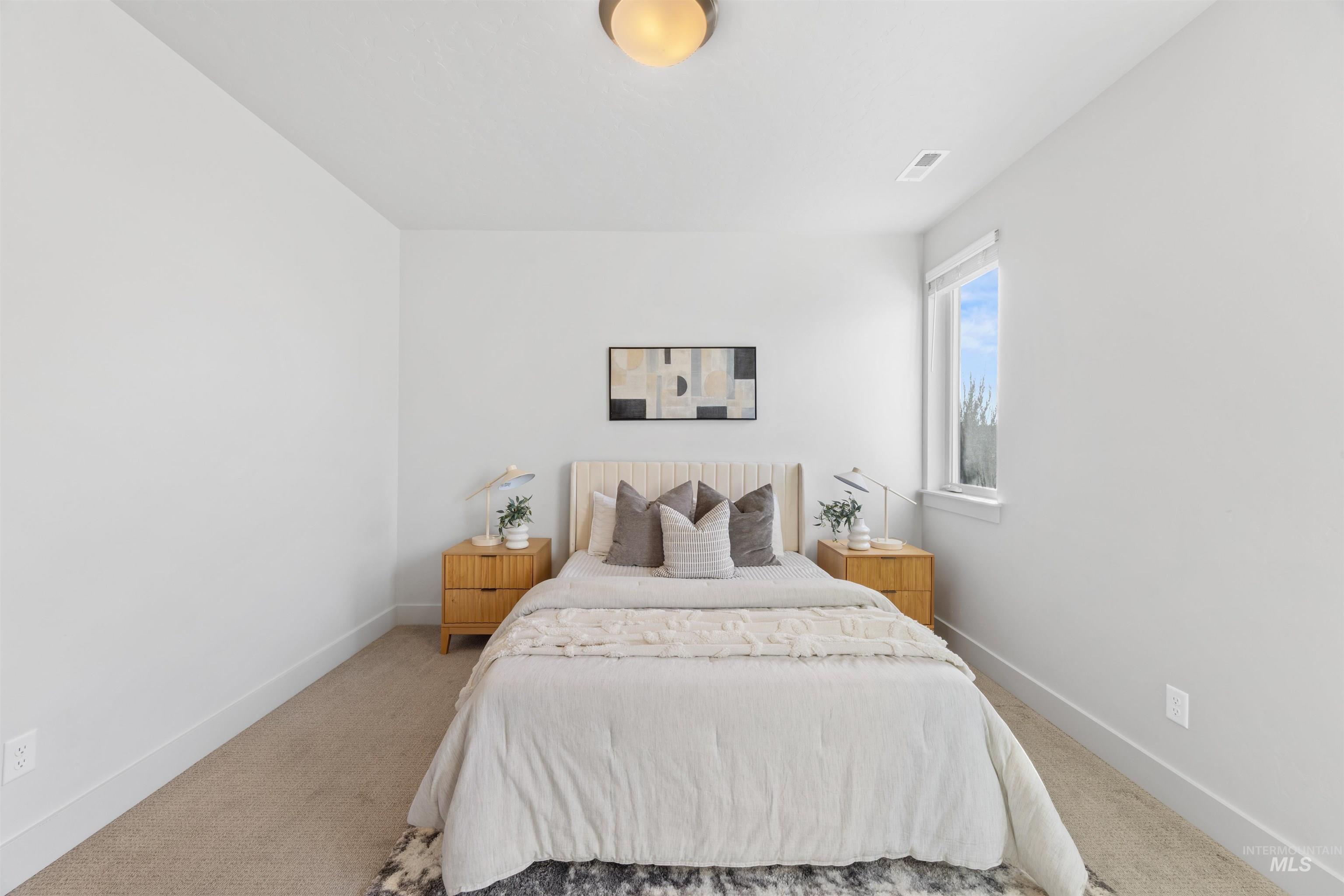 3282 South Millbrook Way Boise, ID 83716 - Photo 8 of 45 Carpeted bedroom with baseboards