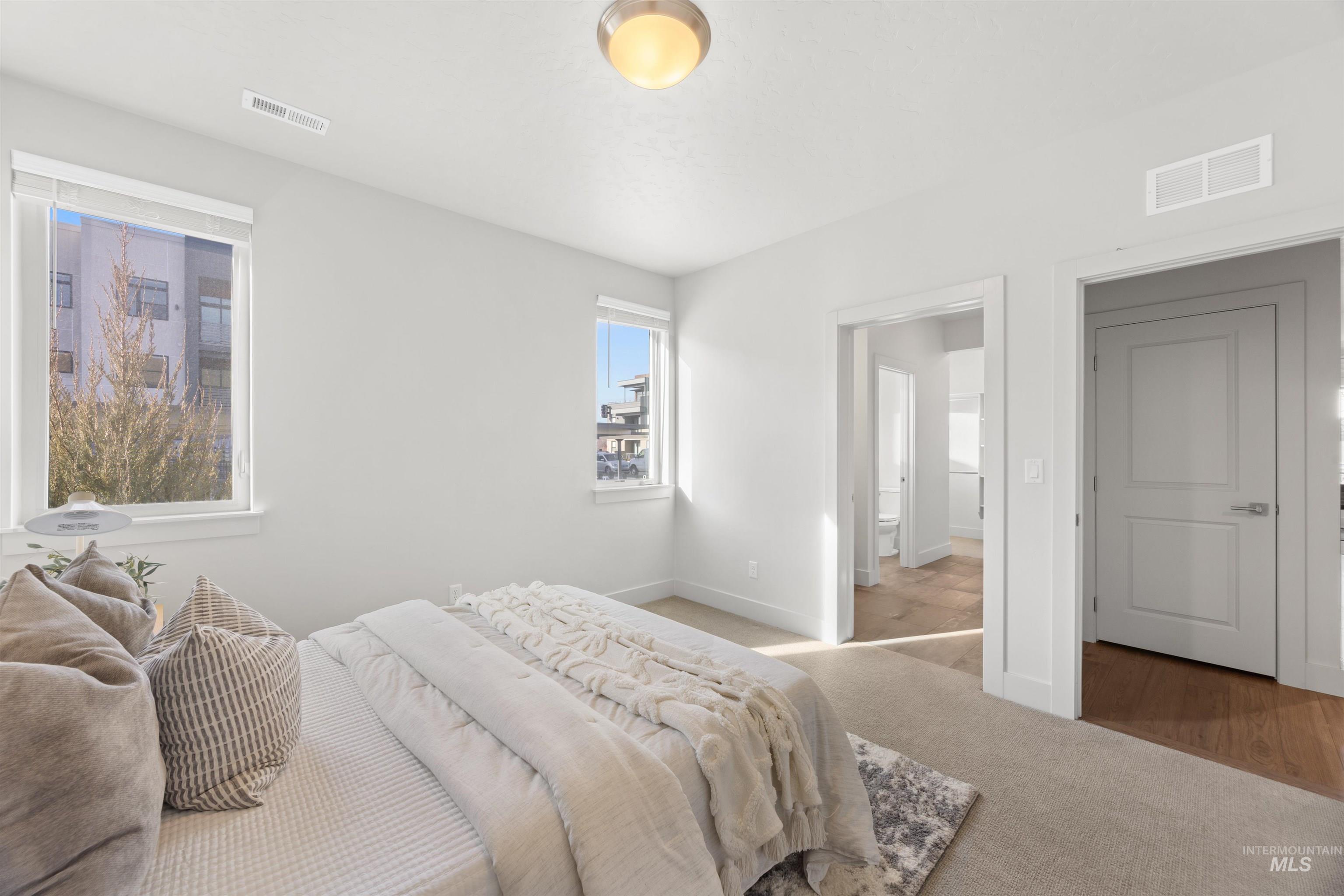 3282 South Millbrook Way Boise, ID 83716 - Photo 9 of 45 Carpeted bedroom with baseboards